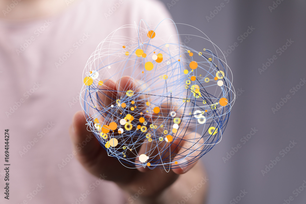 Poster abstract image of a hand holding a digital sphere, representing global network connections and data 