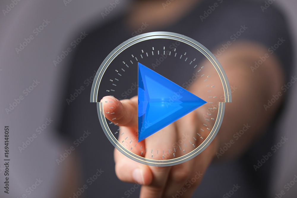 Aufkleber abstract image of a hand interacting with a digital play button, perfect for technology and media co