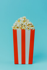 Enjoying a fresh popcorn snack in a vibrant setting for movie nights