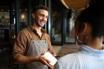 Passionate barista and business owner bringing warmth and quality service to his stylish coffee shop