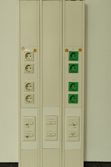 Image of three wall-mounted units with multiple power outlets and switches.  Ideal for industrial, commercial, or technical contexts.