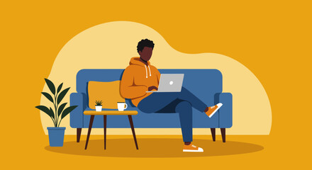 Young man comfortably working on a laptop from his couch at home. Ideal for remote work, education, or freelance concepts.
