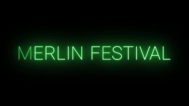 Flickering neon green merlin festival sign animated on black background.
