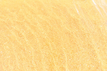 seawater on spotty sand