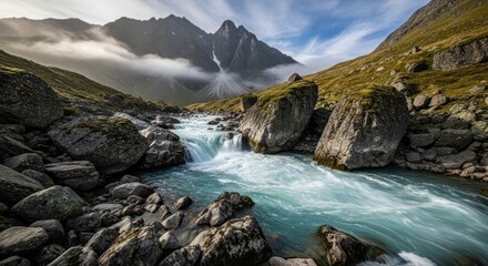 Majestic alpine landscape featuring a vibrant turquoise river flowing through a rugged valley