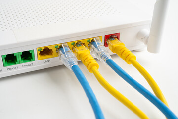 Ethernet cable with wireless router connect to internet service provider internet network.
