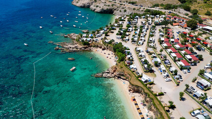 Campsite at Campig Skrila, Krk Island, Stara Baska Croatia, Aerial View of the Mountains and Coast With Boats, Beaches and Adriatic Sea. The Seaside Rv Campmobiles on a Summer Beautiful Coastline