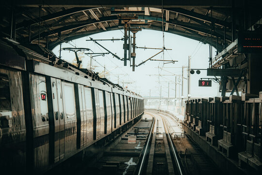 Pictures of Delhi Metro train. Metro rail in Delhi. View of The Delhi Metro is running on the tracks towards the Blue Line and Pink Line.