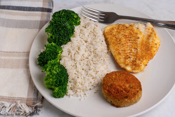 baked haddock and crab cake  with  rice