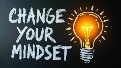 'Change your mindset' writing on blackboard