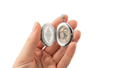 cherished memories a hand holds open an antique silver locket, revealing a timeless portrait of love, isolated on transparent background