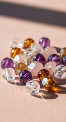 A collection of colorful faceted beads in various shapes and sizes