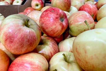 Apples in basket at grocery store, fruits and vegetables are sold at market