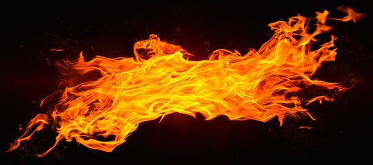 Dramatic red, orange, yellow flame and smoke rising against a dark background. Realistic, abstract...