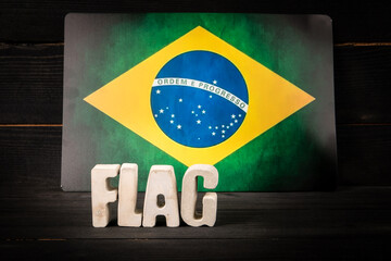 Brazilian flag with bold text word flag in front, symbolizing national pride, culture, identity,...