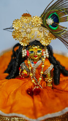 Decorated Lord Krishna Idol with Peacock Feather and Ornaments