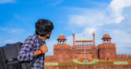 Man Looking at Red Fort in Delhi, India