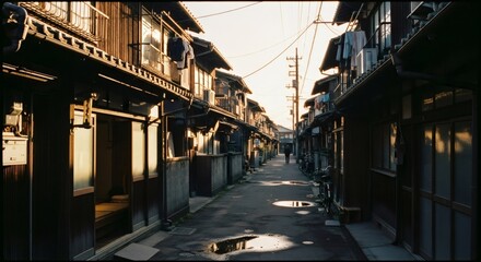 Fototapeta premium Nostalgic urban alley with traditional Japanese architecture. Retro cinematic scene capturing melancholic 80s-90s vibe. Empty street with wooden houses and power lines. VHS aesthetic.