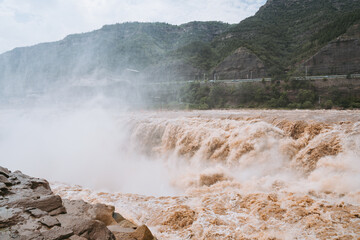 great waterfall in the mountains