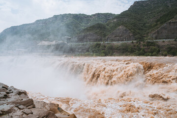 great waterfall in the mountains