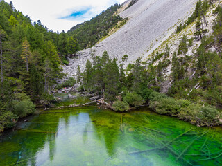 View of the magnificent green lake in a narrow valley (Névache - France)