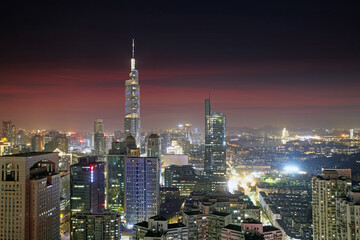 Naklejka premium Aerial view of Nanjing city nightscape and skyscraper cluster, China