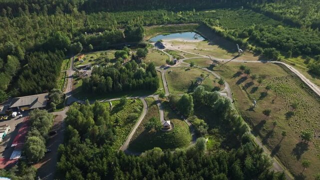 Aerial drone view of Tier-, Freizeit- und Saurierpark Germendorf, popular amusement and wildlife park in Oranienburg, Brandenburg, Germany, family attraction and leisure destination. 15 September 2024