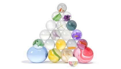 Colorful glass marbles arranged in a triangular pyramid