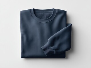 Folded navy blue sweatshirt on white background