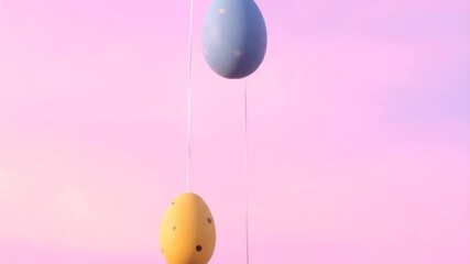 Two easter eggs hanging against gradient pink background - Powered by Adobe