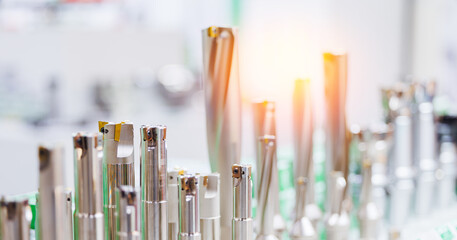 Precision cnc machine parts displayed in industrial setting with sunlight gleam, banner