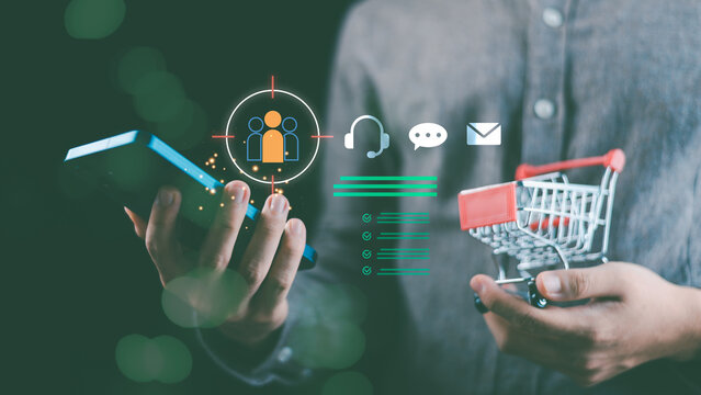 Concept of e-commerce, digital business, and customer engagement with mobile technology and global communication. Symbol of online shopping, marketing strategy, and client-focused service solutions.