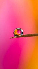 Water droplet on needle, vibrant colors