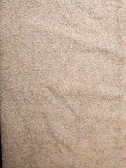 Close up of beige cotton fabric towel texture background