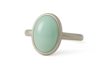 Modern silver ring with a mint green oval stone, isolated on transparent.