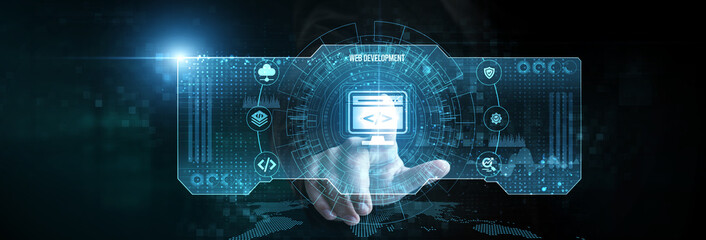 Businessman touching the web development icon on the digital screen analyzing data.
Responsive...