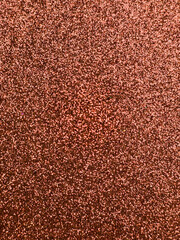 Shimmering rose gold glitter texture background for festive design
