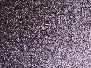 Close up of black textured carpet surface background