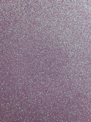 Sparkling pink glitter texture background with shimmering effect