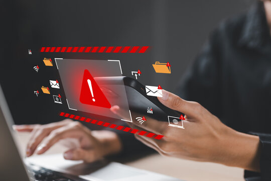 Cybersecurity alert on smartphone with red warning icon, showing risk of phishing, malware, data breach. Concept of digital threat, hacker attack and online information security.