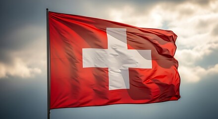 Swiss Flag Outdoors with Cloudy Sky.