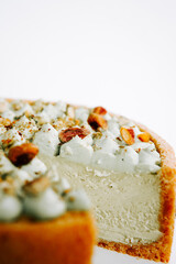 Deliciously crafted cheesecake topped with nuts, showcasing rich flavors and textures