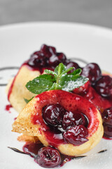Delicious dessert with cherries