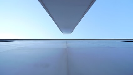 Abstract Aerial View of Airplane Wing and Sky Reflection