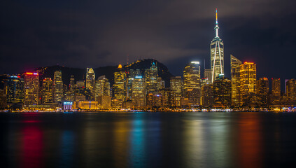 Obraz premium Vibrant Hong Kong Skyline Illuminated at Night