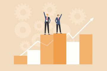 Obraz premium Two businessmen celebrating success standing on a bar chart with upward trending graph and gears in background