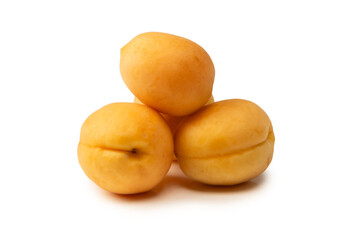 Ripe juicy orange apricots isolated on white background.