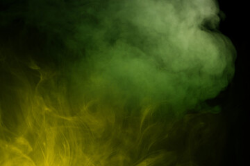 Green and white steam on a black background.