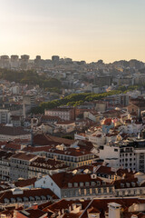 Fototapeta premium Lisbon cityscape with red rooftops and modern skyline 