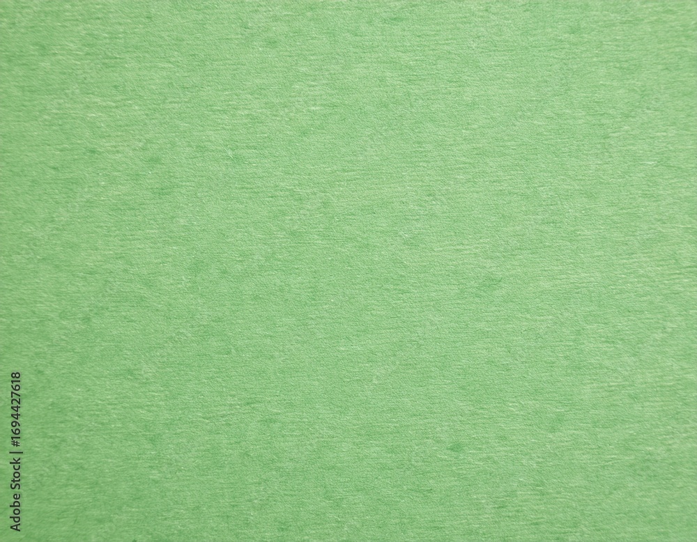 Poster macro view of pale green paper with faintly visible grain texture ideal for eco friendly crafts stat